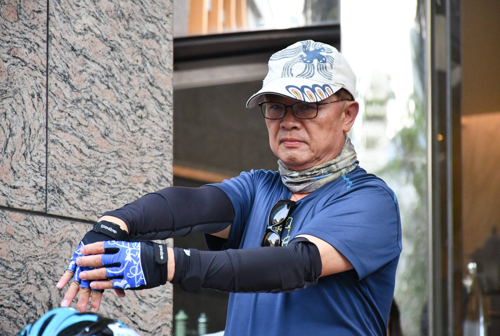 A rider adjusting a glove before setting off