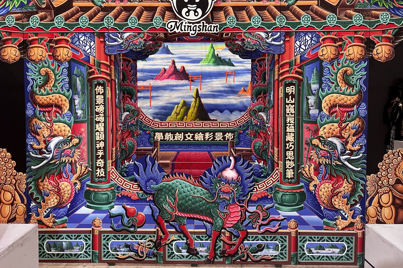 An elaborately painted temple gate mural