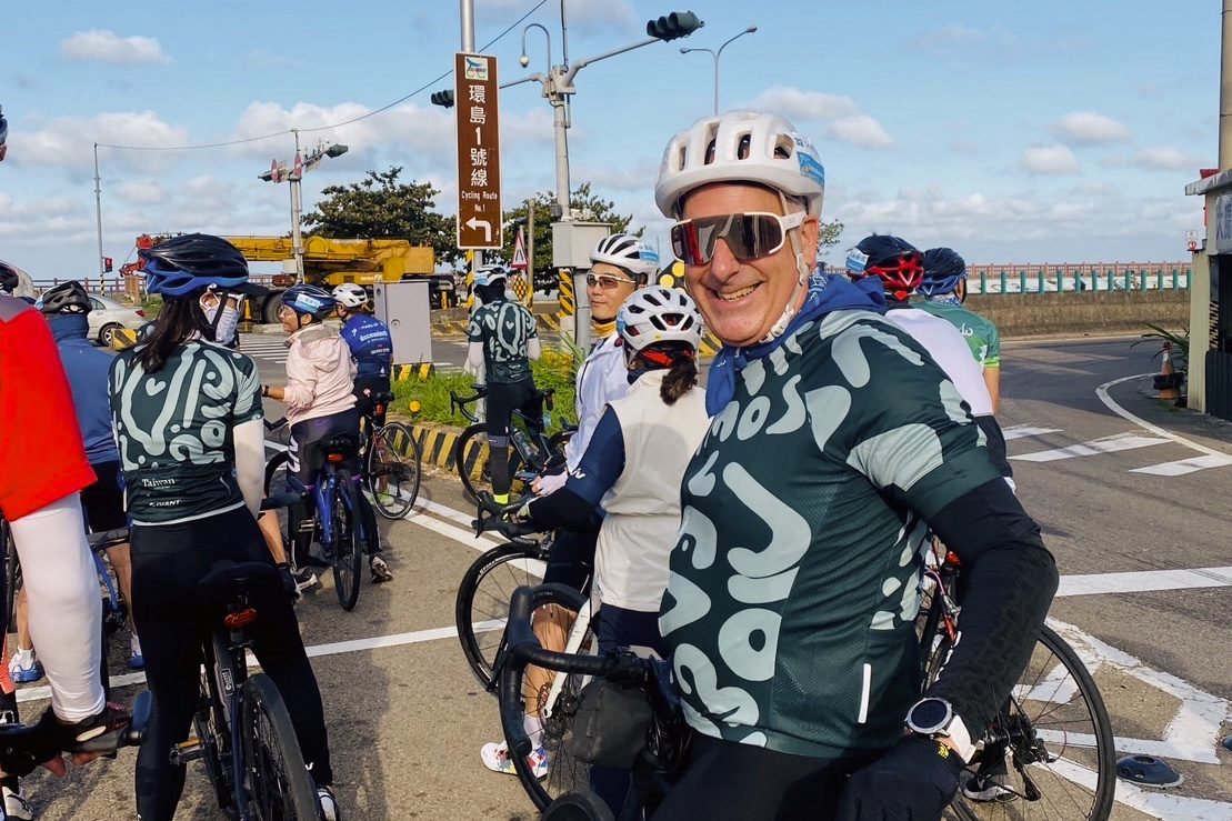 The group gathered at the Cycling Route No. 1 sign