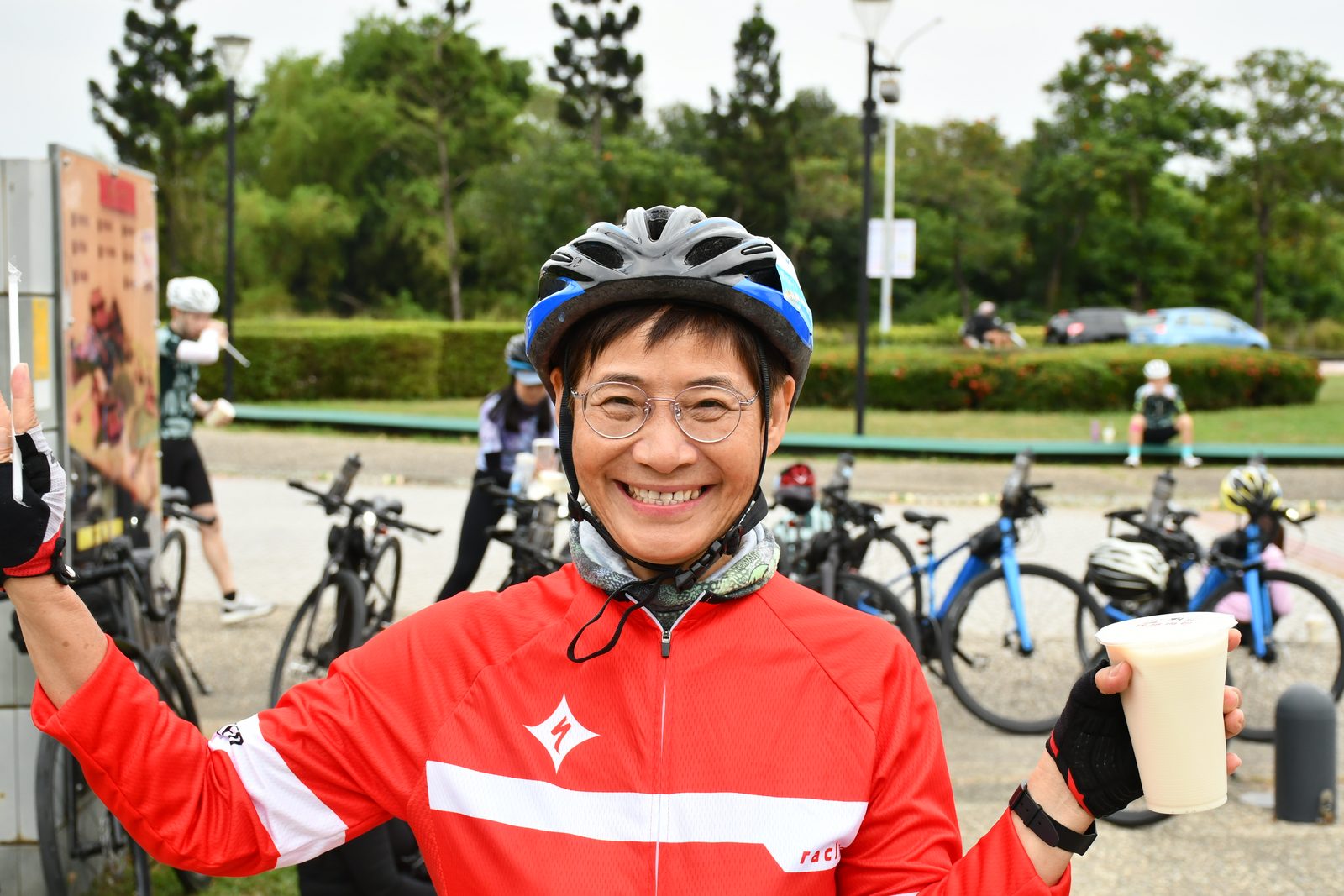 All smiles with a drink at the rest stop