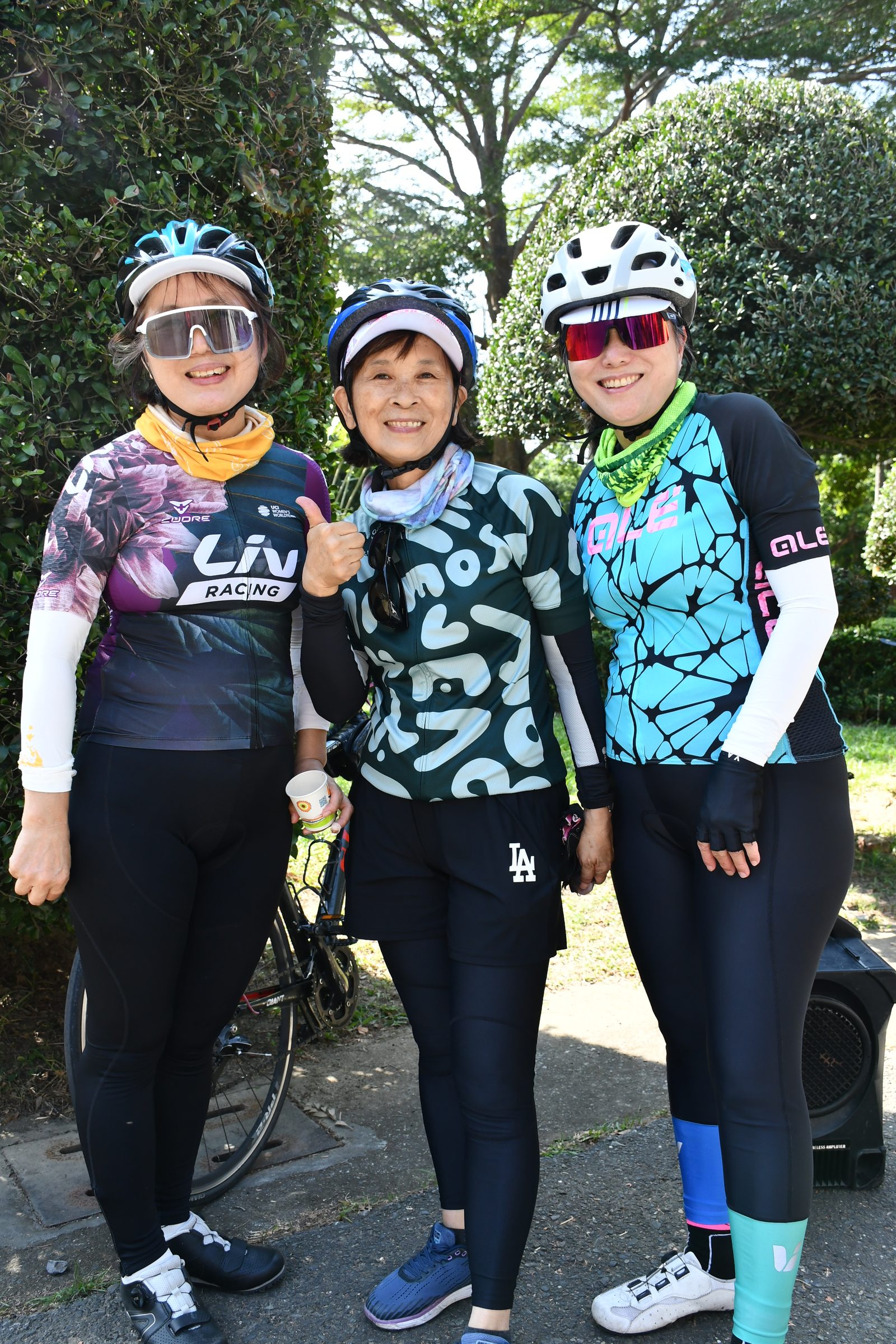 Three friends pausing together on the ride