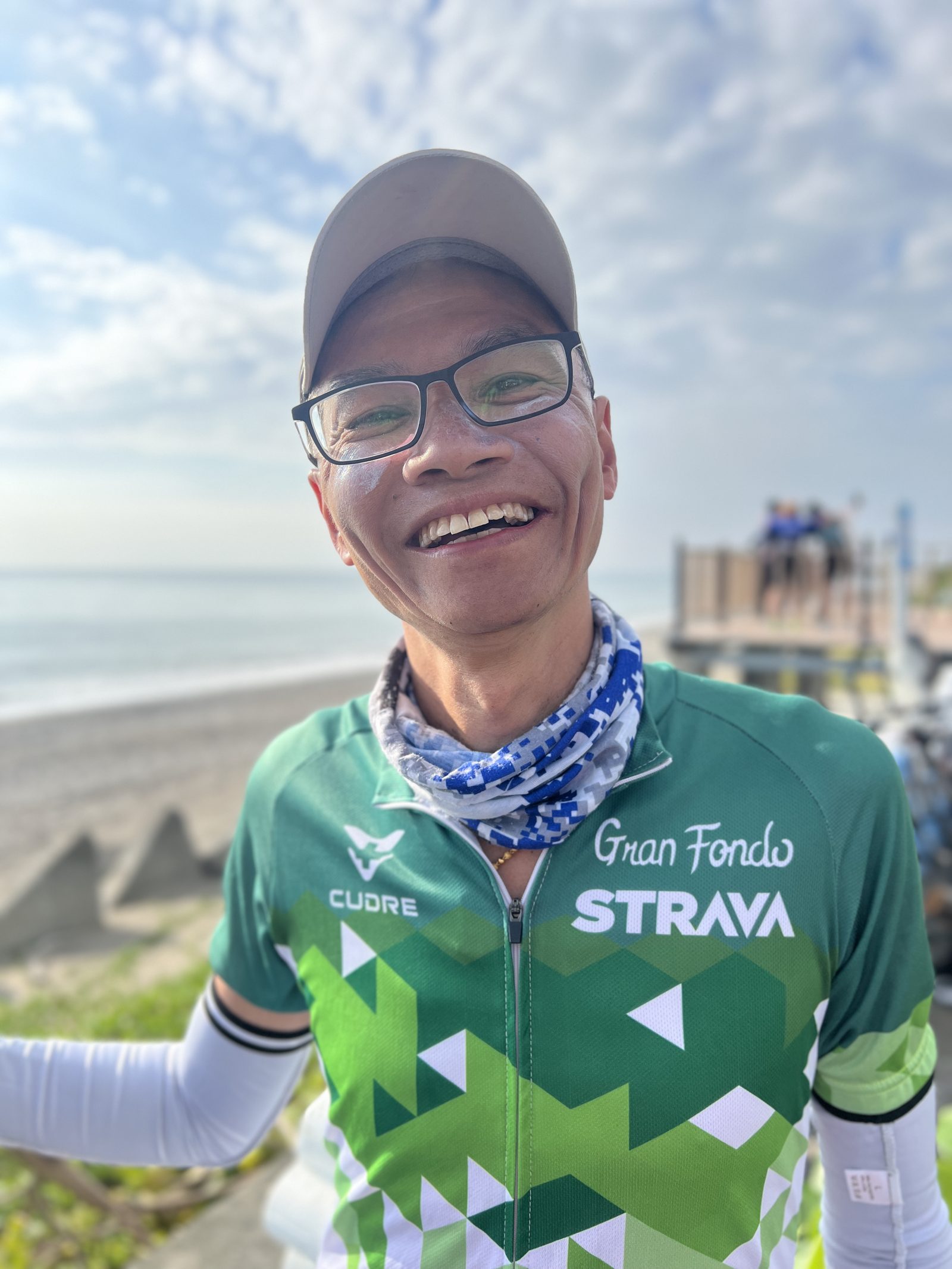 All smiles in a Gran Fondo jersey on the boardwalk