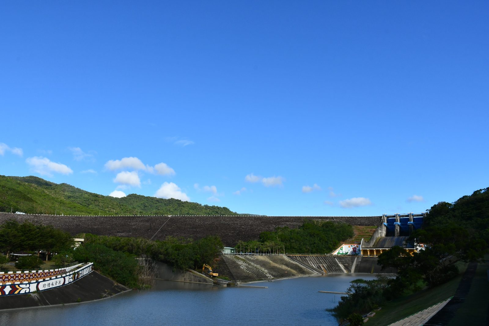 A wide view of the reservoir and dam