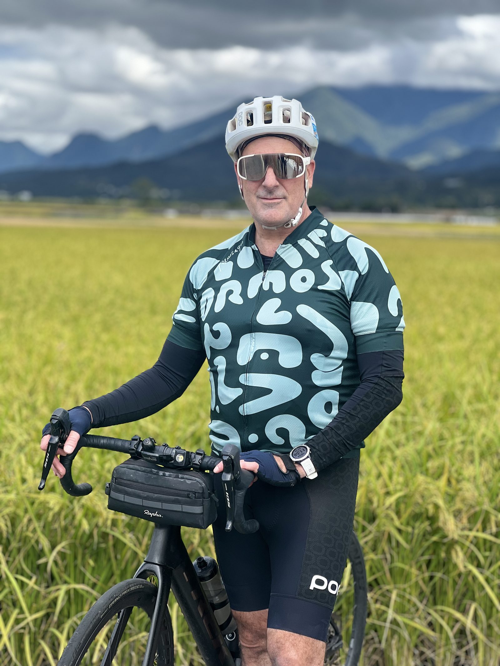 Posing with the bike in a rice field