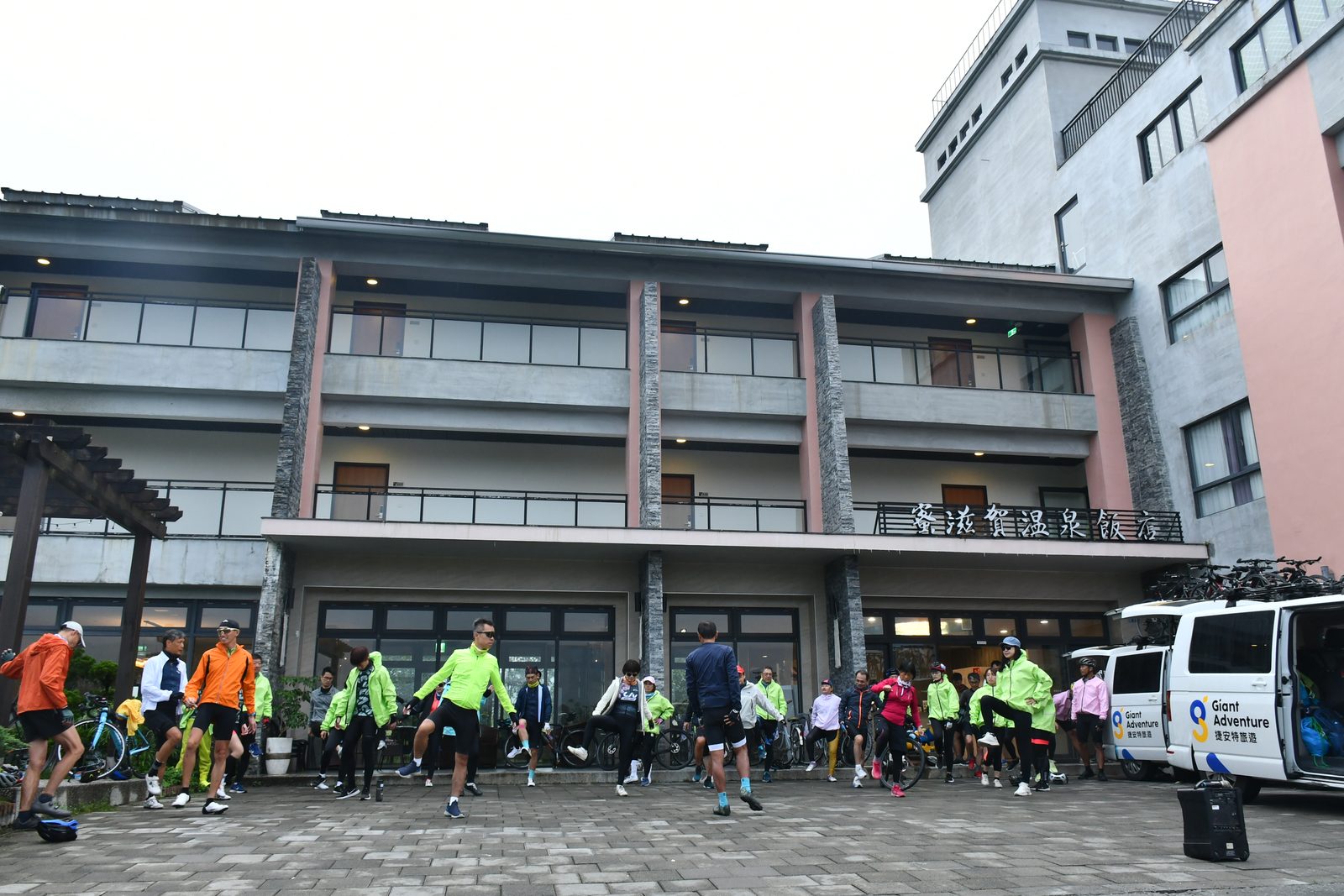 The group stretching in the rain before rollout