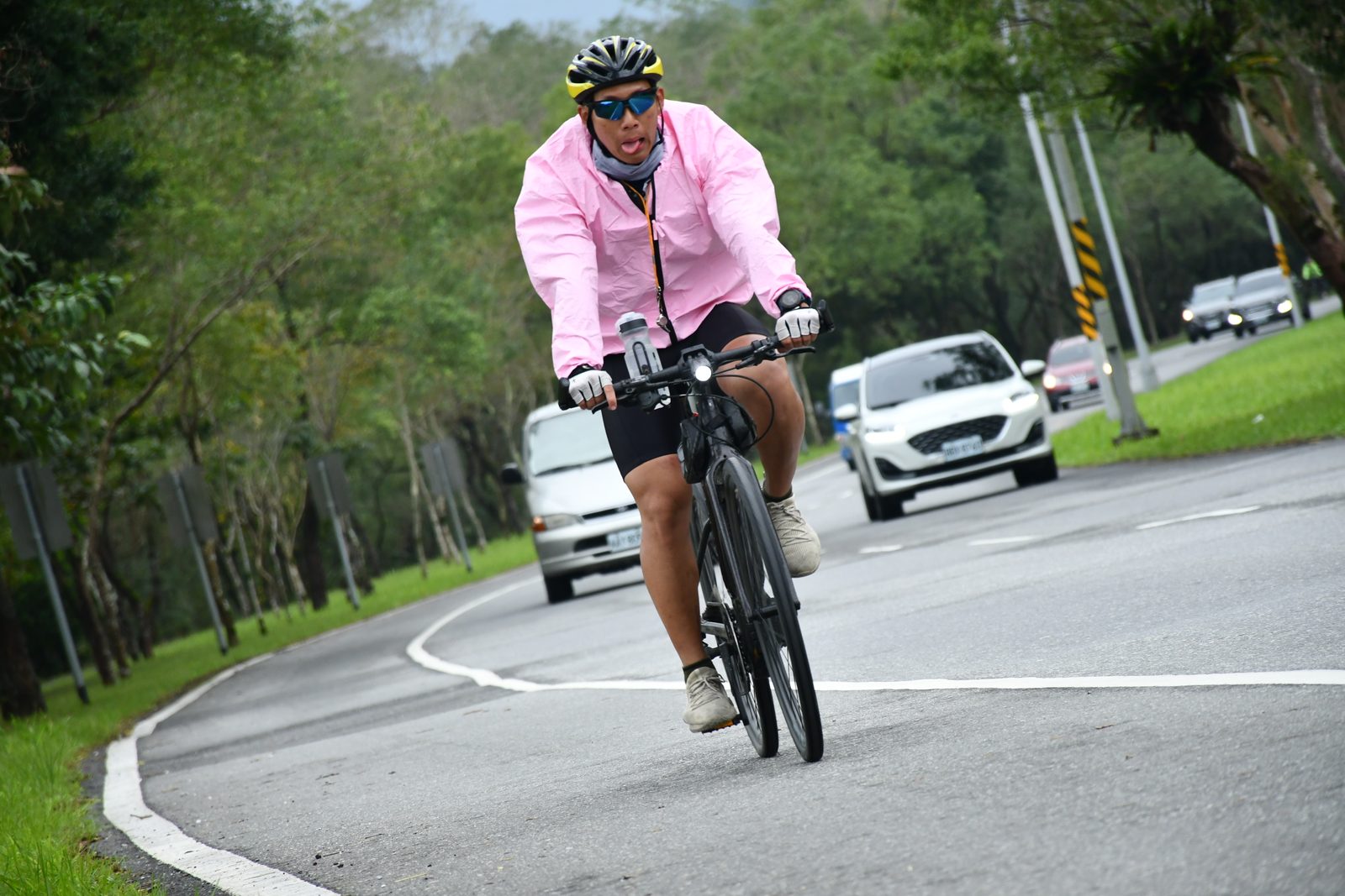 A playful grin riding through the rain
