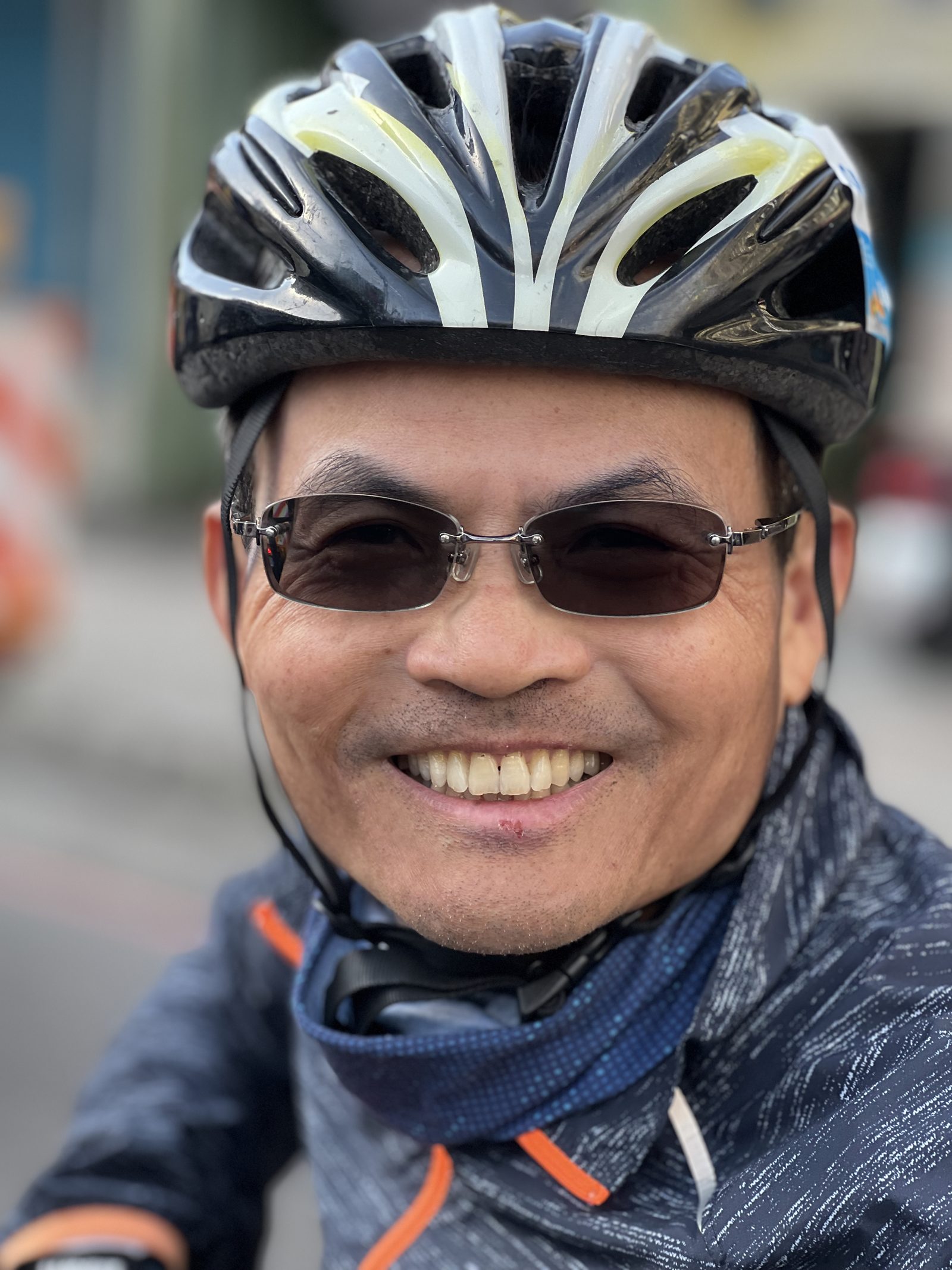 A grinning portrait after a long day's ride