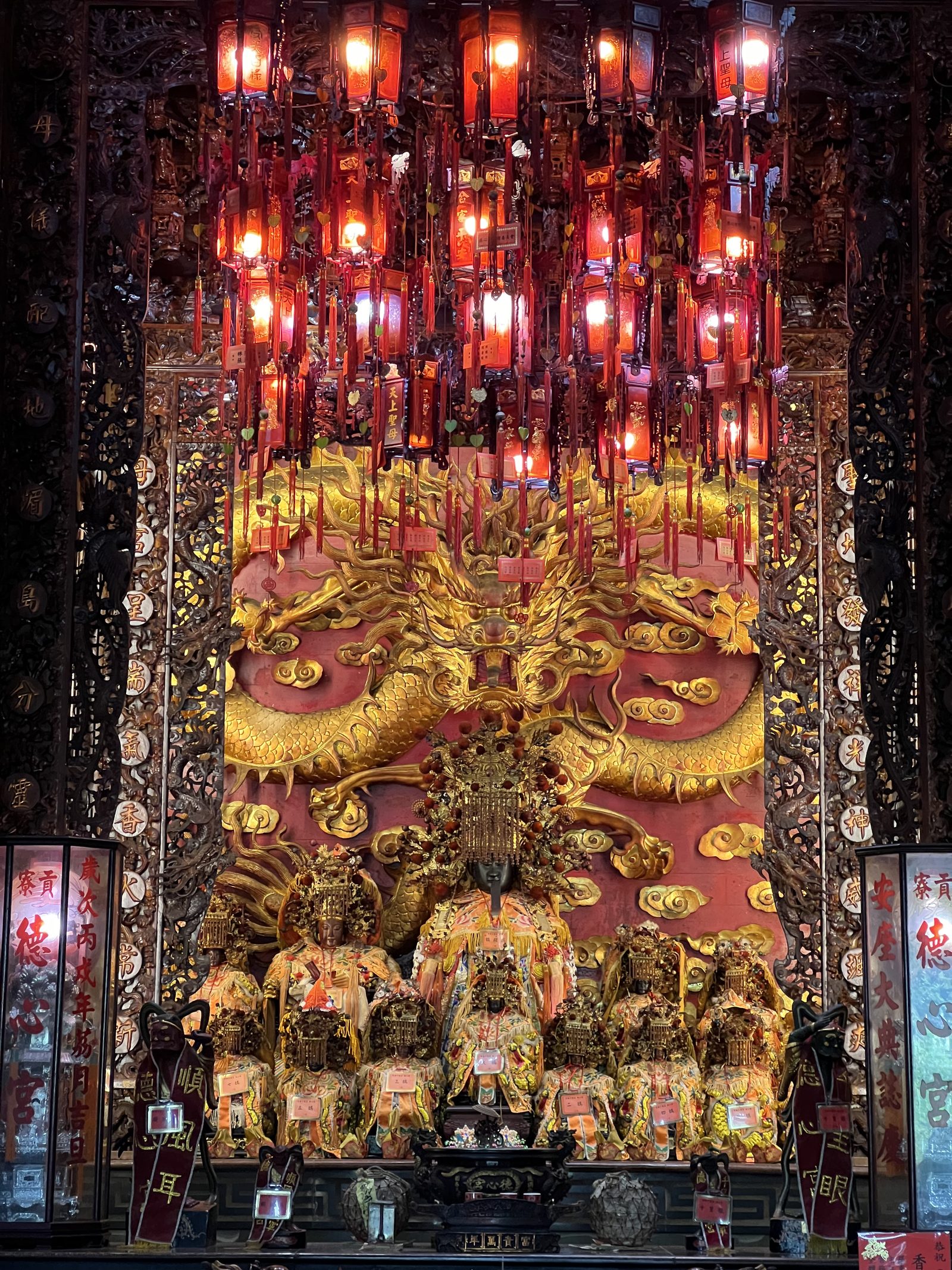 A carved golden dragon inside the temple